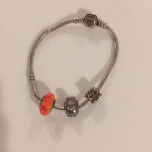 Pandora bracelet with three charms